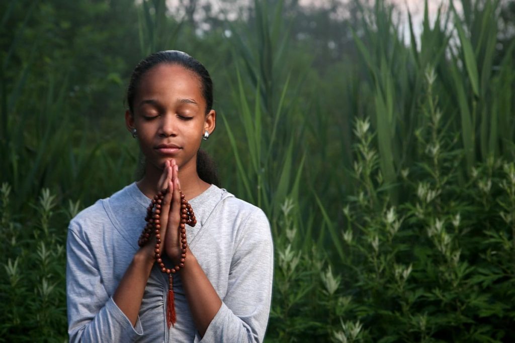 a girl partaking in teen meditation therapy