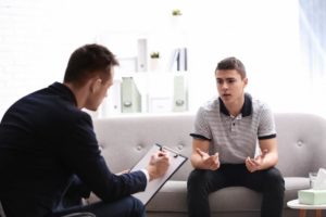 teen in a cognitive behavioral therapy session