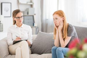 distressed teen in counseling session learning the importance of individual therapy